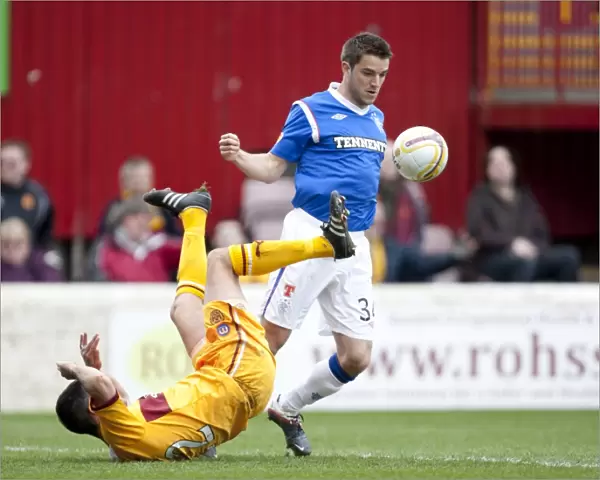 Andy Little Takes Charge: Rangers Victory over Motherwell in Scottish Premier League (1-2)