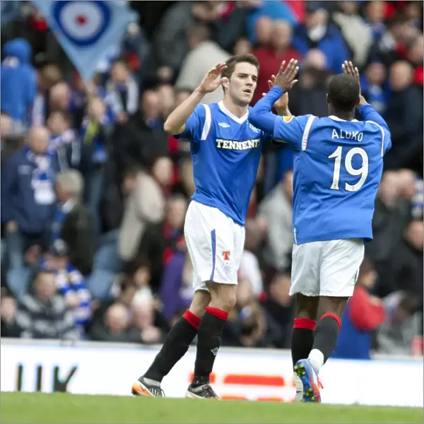 Rangers: Andy Little and Sone Aluko in Jubilant Goal Celebration (3-1 vs St Mirren, Clydesdale Bank Scottish Premier League)