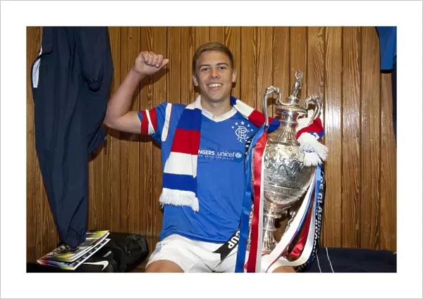 Rangers U17s Triumph: Andy Murdoch's Euphoric Celebration with the Glasgow Cup at Ibrox Stadium (2012)