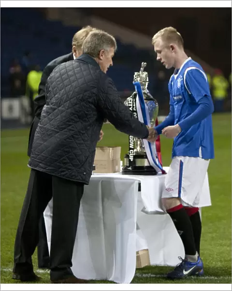 Rangers U17s Glasgow Cup Final Victory: Darren Ramsay Receives Winning Medal from Sandy Jardine at Ibrox Stadium (2012)