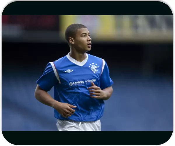 Intense Battle at Ibrox: Rangers U17s vs Celtic U17s - Jamie Burrows Determined Performance (Glasgow Cup Final 2012)