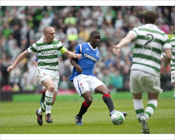 Celtic Park Rivalry: Maurice Edu vs. Scott Brown in Celtic's 3-0 Clydesdale Bank Scottish Premier League Victory