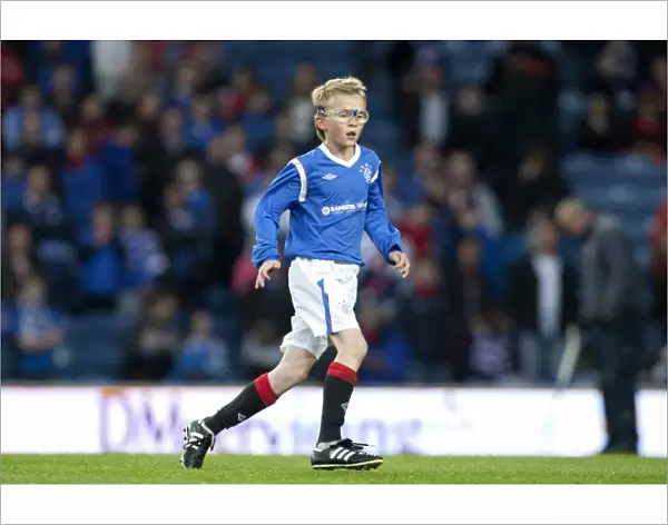 Rangers U11 & U12s Shine at Ibrox: Half Time Fun during Rangers 5-0 Victory over Dundee United