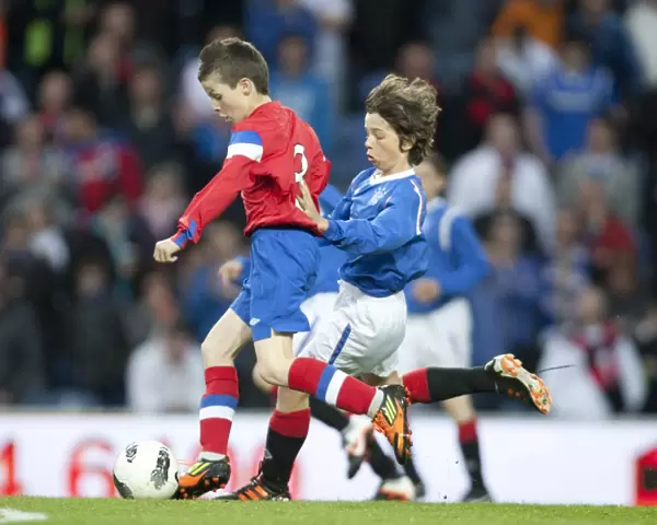 Rangers U11 & U12s Thrill Crowd with Electrifying Half Time Performance Amidst Rangers 5-0 Victory over Dundee United