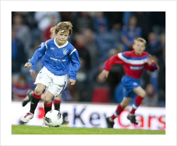 Rangers U11 & 12s Shine: A Memorable 5-0 Half Time Debut at Ibrox against Dundee United