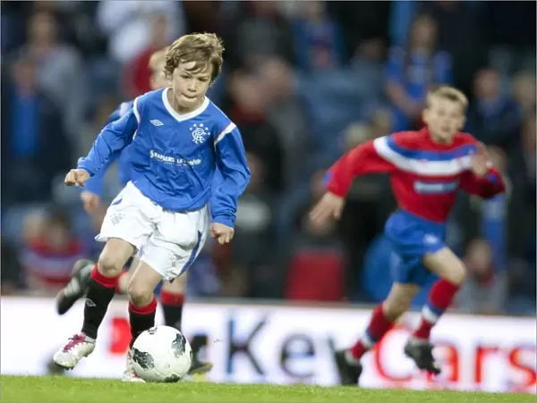 Rangers U11 & 12s Shine: A Memorable 5-0 Half Time Debut at Ibrox against Dundee United