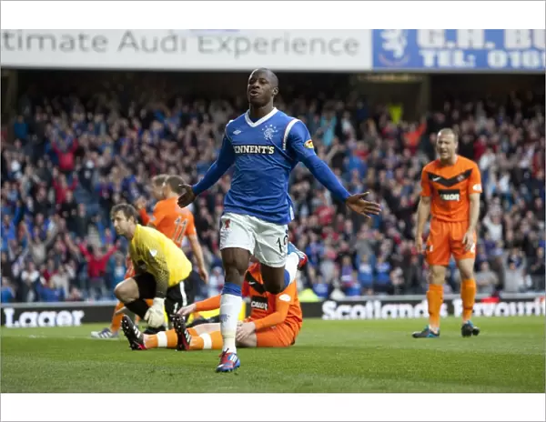 Rangers Sone Aluko Euphorically Celebrates First Goal in 5-0 Victory Over Dundee United at Ibrox Stadium