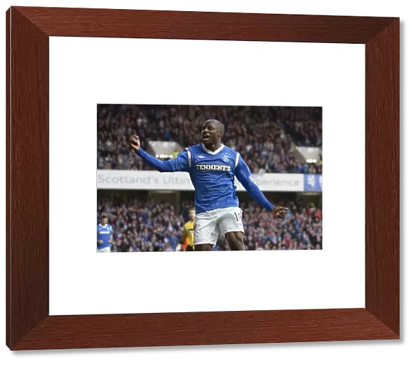 Rangers Sone Aluko: Celebrating His First Goal in the 5-0 Thrashing of Dundee United at Ibrox Stadium (Scottish Premier League)