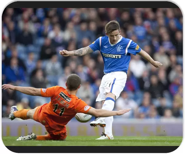 Rangers 5-0 Dundee United: A Clash of Midfield Titans - McCabe vs. Rankin at Ibrox