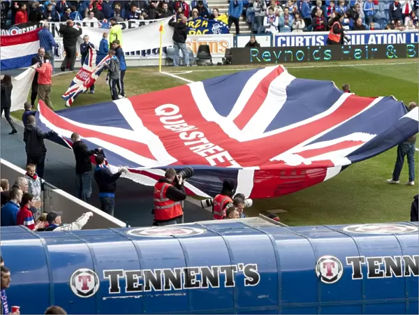 Rangers Fans United: A Sea of Flags at Ibrox Stadium - Passionate Rangers Supporters Rally During SPL Match