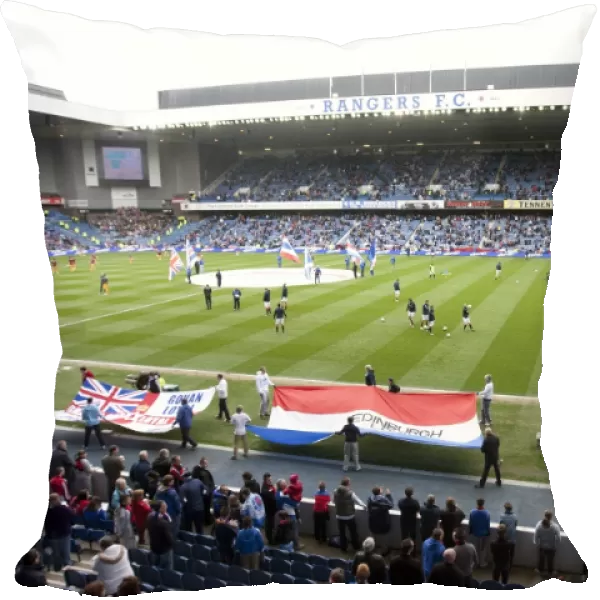 Rangers Fans United: A Sea of Flags at Ibrox Stadium - Passionate Rangers Supporters Rally During the Scottish Premier League Match