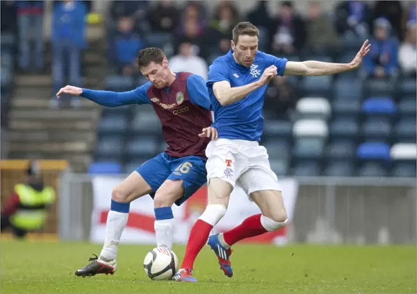 Rangers Kirk Broadfoot and Daryl Fordyce Clash as Rangers Take 2-0 Lead Over Linfield at Windsor Park
