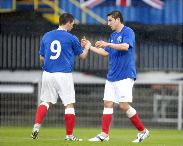 Rangers Bedoya and Healy: Unstoppable Duo Celebrates 2-0 Goal Against Linfield at Windsor Park