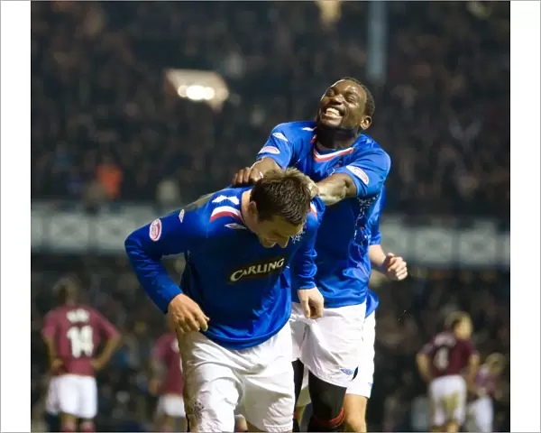 Rangers Dramatic Victory: McCulloch and Darcheville Capitalize on Hearts Goalkeeper's Error for a 2-1 Win (Clydesdale Bank Premier Division)