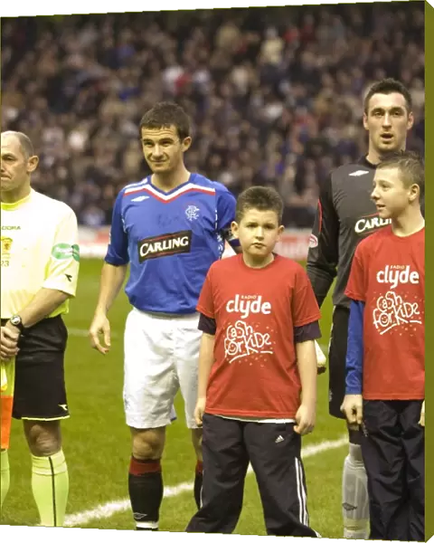 Rangers 2-1 Hearts: Cash for Kids Mascot Celebrates Victory at Ibrox