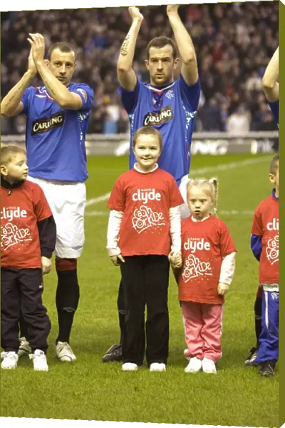 Rangers Football Club's Thrilling 2-1 Victory over Heart of Midlothian with Cash the Mascot at Ibrox