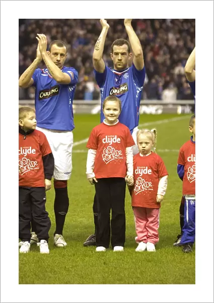 Rangers Football Club's Thrilling 2-1 Victory over Heart of Midlothian with Cash the Mascot at Ibrox