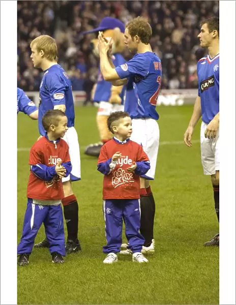 Thrilling Rangers 2-1 Victory over Hearts at Ibrox: Cash the Mascot's Exciting Day