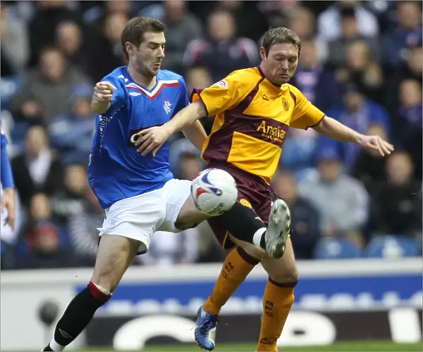 Rangers Triumph: Thomson and McGarry Clash in Exciting 3-1 Victory over Motherwell at Ibrox