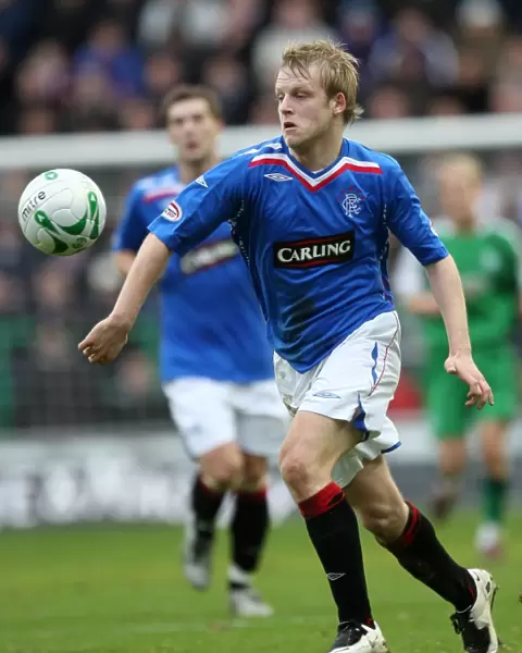 Naismith's Stunner: Rangers Clinch Victory Over Hibernian in Clydesdale Bank Premier League (1-2)