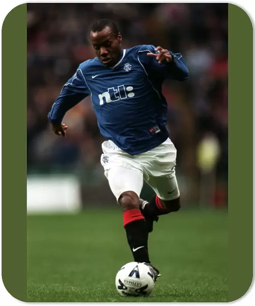 Rangers vs Celtic: Rod Wallace's Thrilling Action in the Bank of Scotland Premier League (Historic)