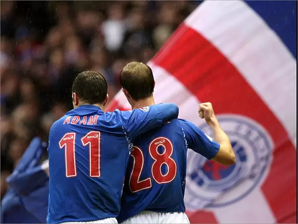 Rangers Whittaker and Adam: Celebrating a Triumphant Third Goal in Rangers 4-0 Victory Over St. Mirren (Clydesdale Bank Premier League)