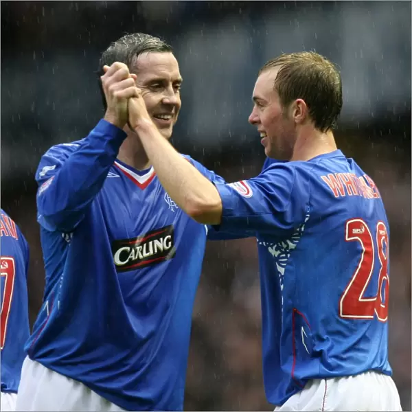 Rangers Steven Whittaker and David Weir: A Jubilant Moment after Rangers 4-0 Victory over St Mirren at Ibrox - Whittaker's Goal Celebration with Weir