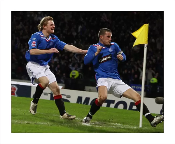 Rangers Barry Ferguson and Chris Burke: Rejoicing in a 2-0 Victory over Heart of Midlothian in the CIS Insurance Cup Semi-Final at Hampden Park