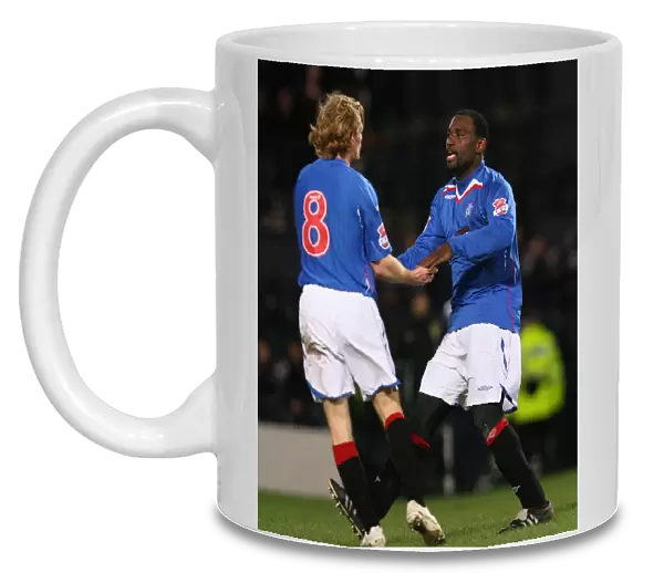 Rangers Darcheville and Burke: Celebrating a 2-0 Lead Over Heart of Midlothian in the CIS Insurance Cup Semi-Final at Hampden Park