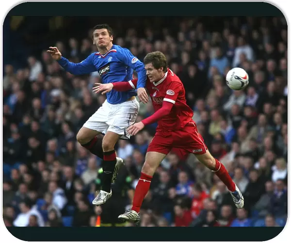 Intense Rivalry: Barr vs McCulloch - Rangers 2-0 Victory over Falkirk at Ibrox (Clydesdale Bank Premier League)