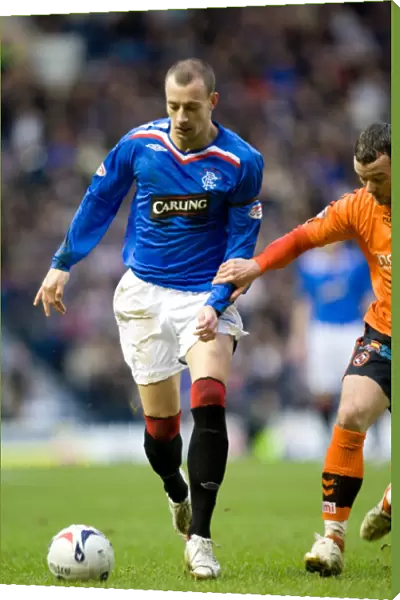 Rangers 2-0 Dundee United: Alan Hutton's Thrilling Ibrox Goal (Clydesdale Bank Scottish Premier League)
