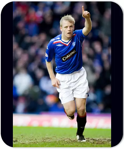 Naismith's Decisive Strike: Rangers 2-0 Dundee United in the Scottish Premier League at Ibrox