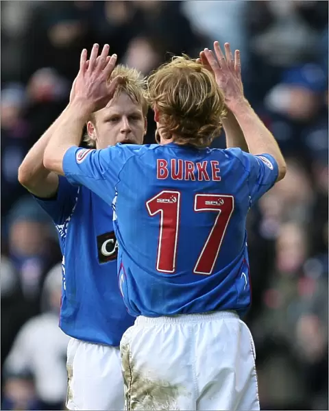 Triumphant Rangers Duo: Chris Burke and Steven Naismith Celebrate Goal Number Three Against St. Mirren (4-2)