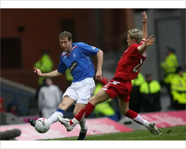 Rangers Kirk Broadfoot Celebrates Glory: 3-1 Win Over Aberdeen in Scottish Premier League at Ibrox Stadium