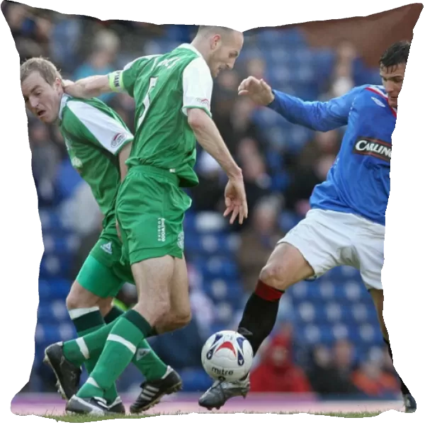 Determined Clash: Lee McCulloch vs Jones and Kerr in the Scottish Cup Fifth Round Replay: Rangers 1-0 Hibernian