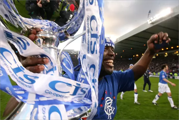 Rangers Football Club: Jean-Claude Darcheville and Team Celebrate CIS Cup Victory over Dundee United at Hampden Park (2008) - CIS League Cup Winners