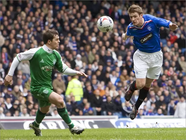 Thrilling Winner: Rangers Steven Davis Scores the Difference at Ibrox (2-1 vs Hibernian, Clydesdale Bank Premier League)