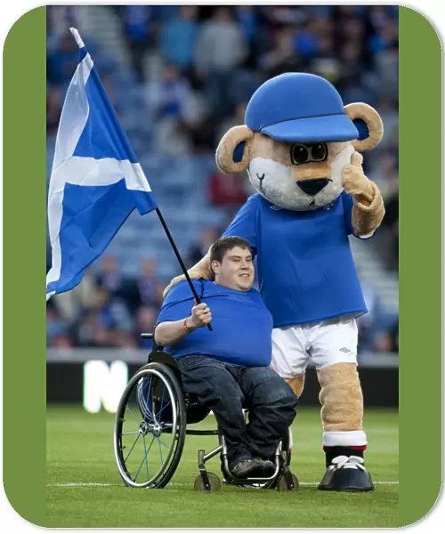 Rangers Flag Bearer Celebrates Glory: 3-0 Scottish League Cup Victory over Falkirk at Ibrox Stadium
