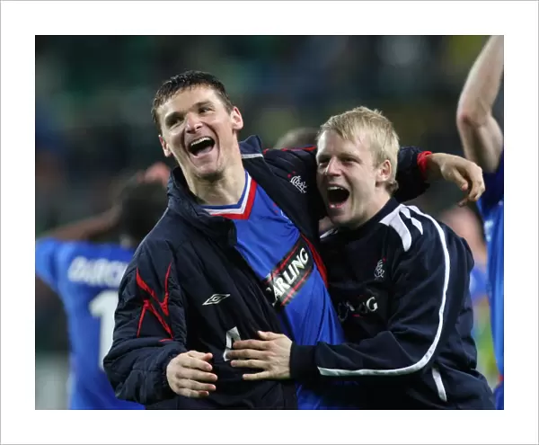Rangers McCulloch and Naismith Celebrate 2-0 Quarter-Final Lead Over Sporting Lisbon