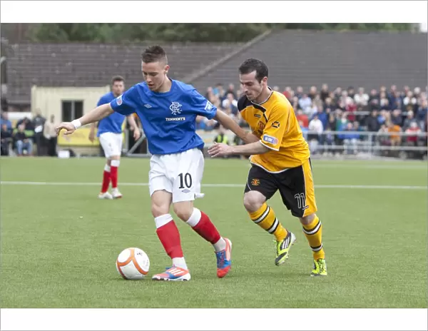 Barrie McKay vs. David Murray: A Scoreless Rivalry at Annan Athletic's Galabank Stadium - Rangers in Scottish Third Division Soccer