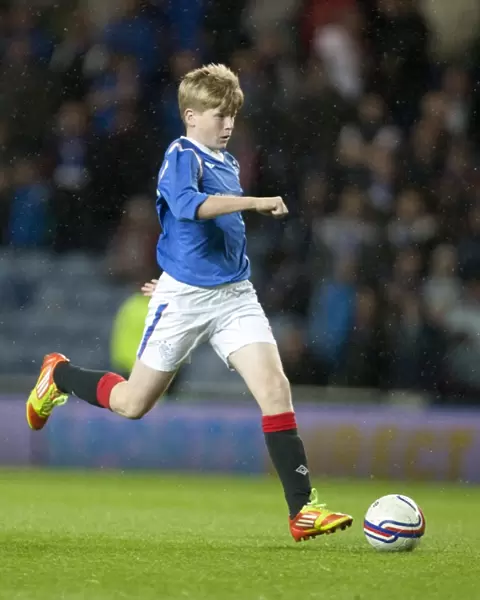 Half Time Penalty Showdown: Exciting Ramsden Cup Quarter-Final at Ibrox Stadium - Rangers vs Queen of the South (2-2)