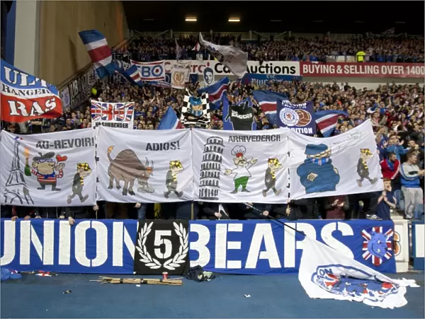 Rangers FC's Triumphant Win Against Motherwell: A Sea of Supporters and Flags at Ibrox Stadium (2-0)