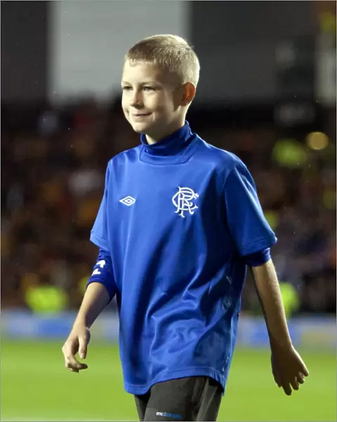 Rangers Lead 2-0 against Motherwell: The Exciting Half Time Broxi Bear Challenge at Ibrox Stadium