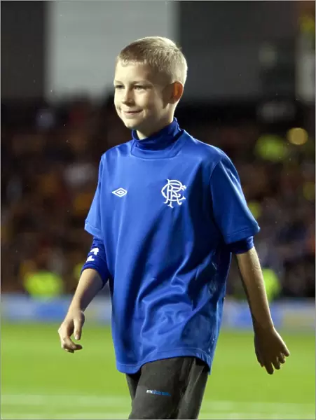 Rangers Lead 2-0 against Motherwell: The Exciting Half Time Broxi Bear Challenge at Ibrox Stadium