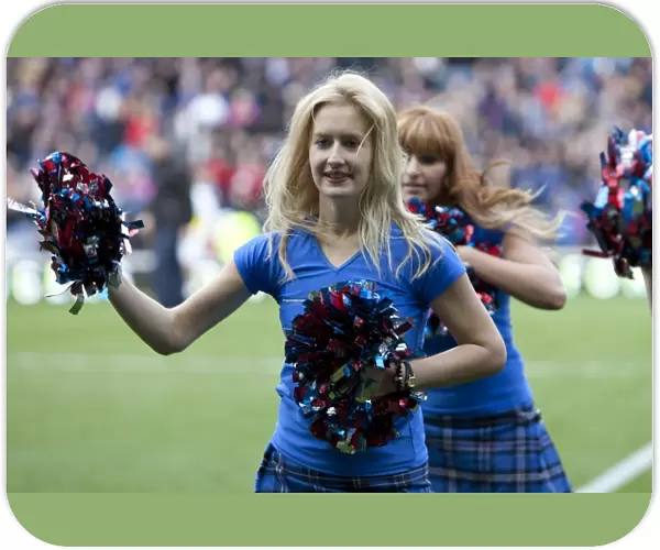 Rangers Lead 2-0 Against Queens Park: Excitement Amongst Rangers Cheerleaders at Ibrox Stadium