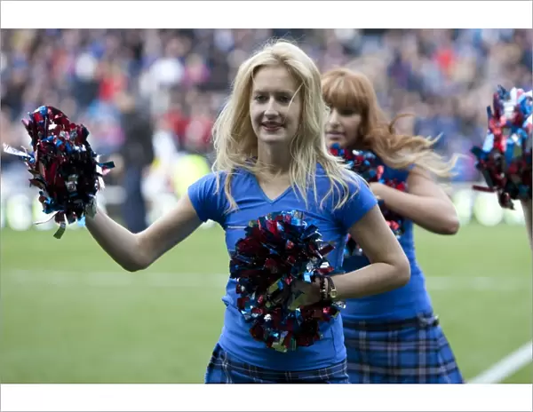 Rangers Lead 2-0 Against Queens Park: Excitement Amongst Rangers Cheerleaders at Ibrox Stadium