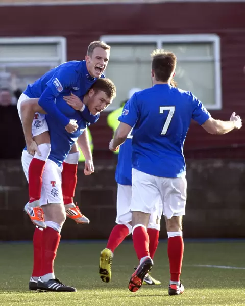 Celebrating Victory: Dean Shiels and Kevin Kyle's Jubilant Moment After Kyle's Goal (6-2) - Rangers vs East Stirlingshire