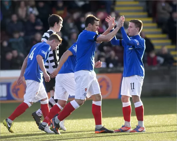 Rangers Double Delight: Lee McCulloch and Teammates Celebrate Six-Goal Blitz Against East Stirlingshire