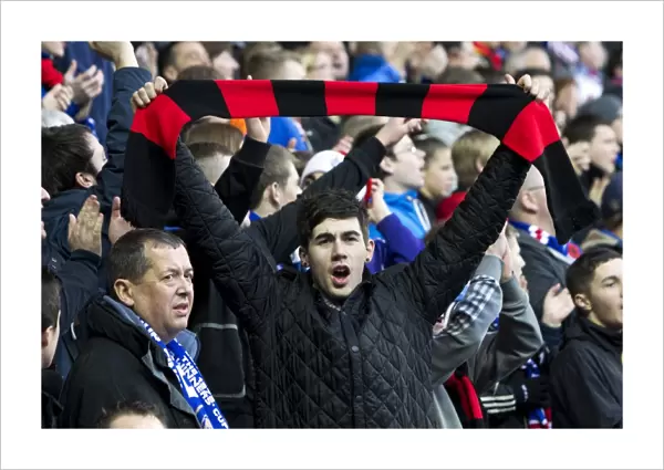 Exultant Rangers Fan Celebrates with Scarf at Ibrox Stadium: Rangers 2-0 Stirling Albion
