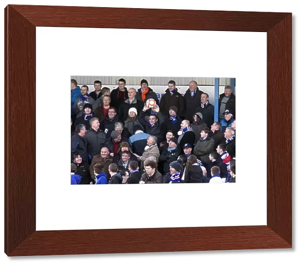Rangers Fan's Triumph: Celebrating with the Match Ball after Montrose vs Rangers: 4-2 Victory